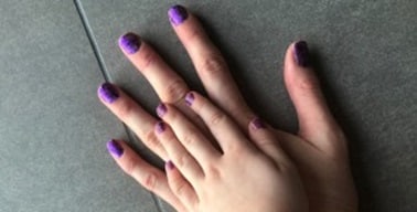 TwoHandswithPurpleNailsup 2021